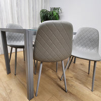 Glass Dining table and 4 grey leather chairs  Grey Glass Table And 4 Chairs kitchen dining room furniture