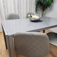 Glass Dining table and 4 grey leather chairs  Grey Glass Table And 4 Chairs kitchen dining room furniture