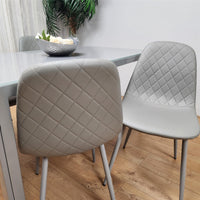 Glass Dining table and 4 grey leather chairs  Grey Glass Table And 4 Chairs kitchen dining room furniture